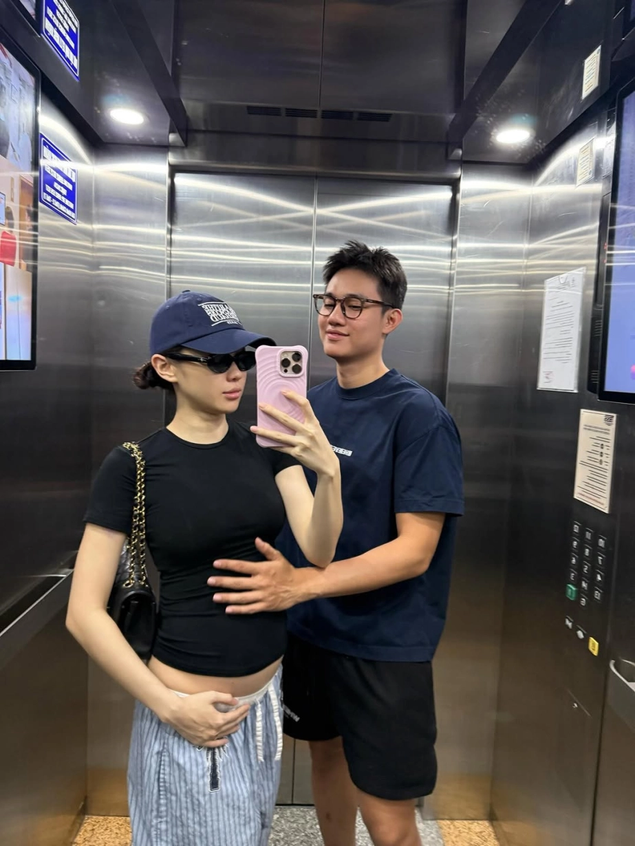 Style khoe bụng bầu triệt để của tiktoker ly phạm